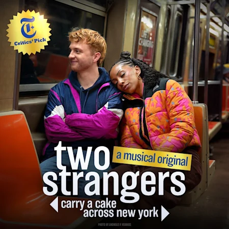 *Two Strangers (Carry a Cake Across New York)* is an original, new musical comedy about two ordinary people, a cheery Brit and a lifelong New Yorker, who go on a city adventure and spark a connection along the way.